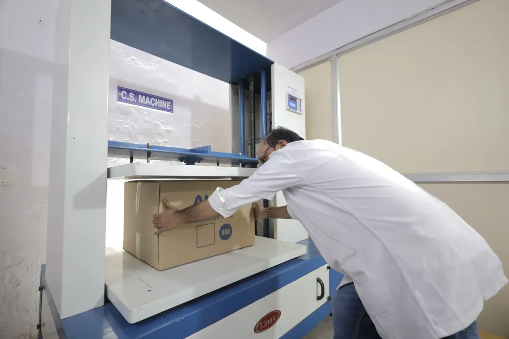 Box Compression Strength (BCT) Machine in the Asian Packaging in-house quality laboratory