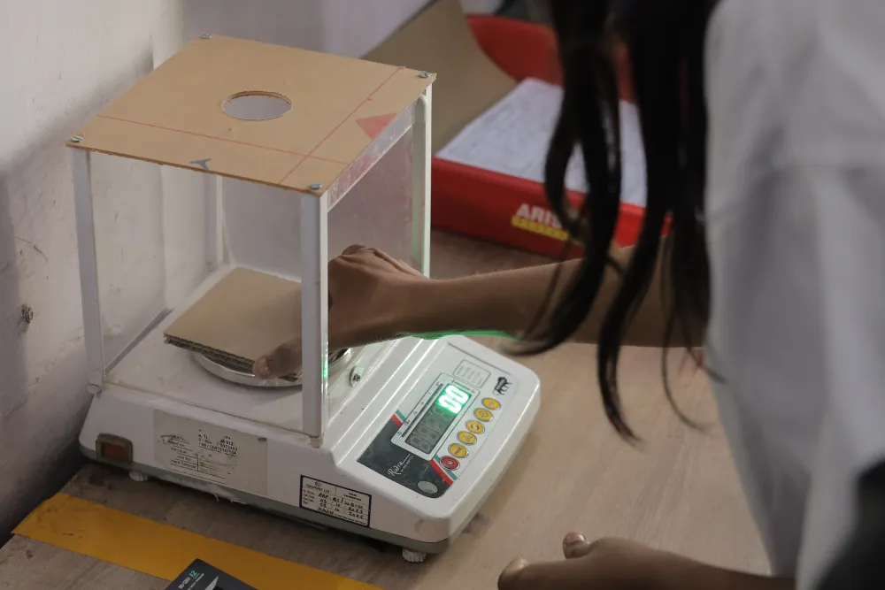GSM Testing Machine in the Asian Packaging in-house quality laboratory